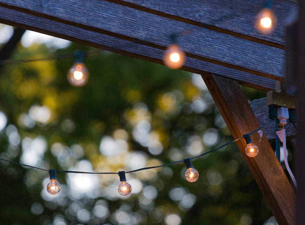 String lights on backyard pergola