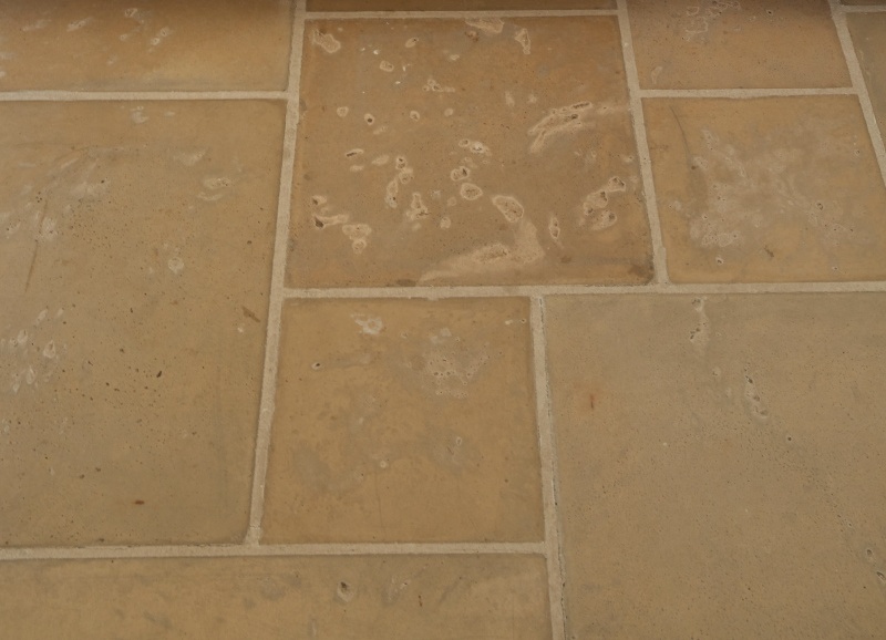 Close-up of wet cast pavers, one of two types of cast stone